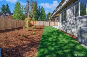 Fully fenced wood rear yards, easy to mow/maintain grass areas plus indoor air conditioning.  Climate perfect inside and outside.