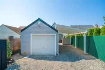 Rebuilt garage & carport offer covered parking for 2