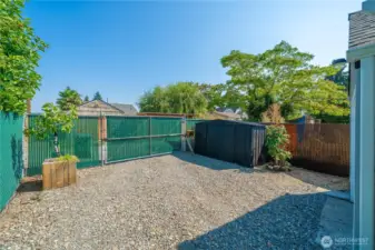 Automatic gate provides secure access to garage & carport. The garden shed is also helpful