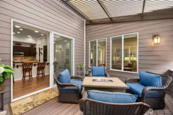 Covered patio has electric louvered roof for all season usage.