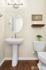 Half bathroom perfectly tucked away