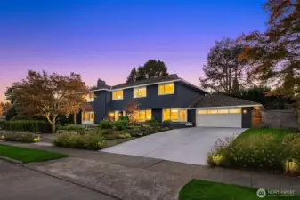 Large driveway and easy access to a 2 car garage with mud room/Laundry room as you enter.