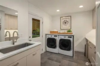 Main floor laundry room.  Located right off the garage and mud room.