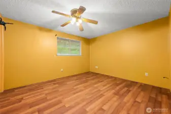 Primary bedroom with attached 3/4 bath.