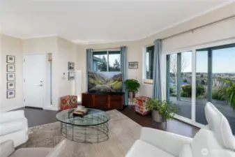 Front Door opens to Living Room.  There is a beautiful deck right outside the slider door!  Enjoy the wonderful water view!