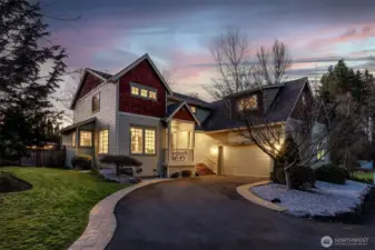 What curb appeal! That curved driveway gives a little drama on the way in and sets up a clean approach to a three car garage that actually fits real life. The exterior has been recently refreshed 2 years ago with paint and a professional roof soft wash, so it presents beautifully right out of the gate. Hardiplank in the front, T111 in the back, and those wood shingle accents up top all come together in a really cohesive, neutral color palette. Landscaping stays simple and tidy, so you get the look without signing up for weekend yard duty.