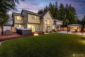 If backyard goals were a checklist, this one’s fully checked off. Turf keeps it green and low effort, the Trex deck gives you room to spread out, and the swim spa steals the show with a built-in staycation vibe. It’s just three years old with warranty time still on the clock, and whether it stays is up to you. You’re also wired and ready for two hot tubs, both 50 and 60 amp, so future upgrades are already handled. The slider off the junior suite lands right here, which makes this whole setup feel like it was planned by someone who enjoys life!