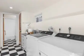 Two washer + dryer sets in the home.