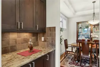 Butler pantry. Coffee bar. Pantry area between kitchen and dining room.