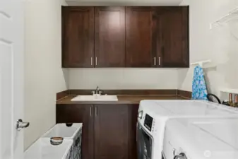Convenient upper level laundry room.