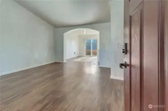 Entry into the living room, beautiful laminated hardwood flooring.