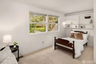 Most of the bedrooms feature walk-in closets and built-in shelving, offering ample storage space and enhancing the home's functionality and organization