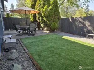 6607 current photo of backyard with BBQ and outdoor furnishings