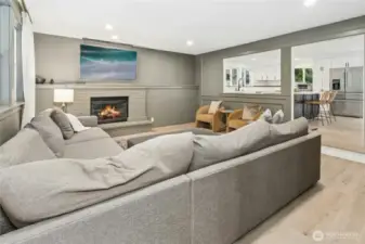 Living room off of the kitchen/dining with gas fireplace