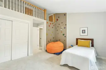 2nd bedroom upstairs with rock climbing wall & loft