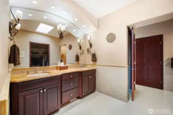 The luxurious 5-piece ensuite includes a double vanity, jetted tub, walk in closet, and walk in shower.