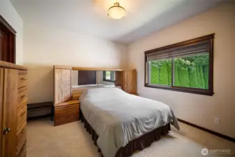 The second bedroom upstairs currently with a queen set in it.