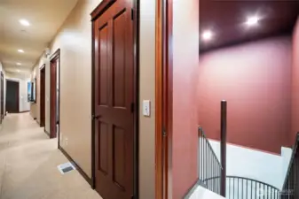 At the end of the hall, we can go behind to the large 3 car garage, but first we will head to the lower level unit.