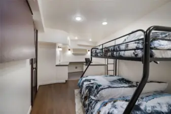 There is a bonus room that has office space right off of the main rec room.