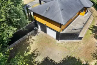 The lower garage is tall enough for an RV Bay.
