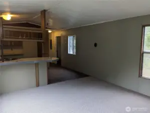 Looking towards hallway and kitchen