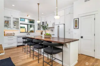 This is a WOW kitchen with large walnut-counter island.