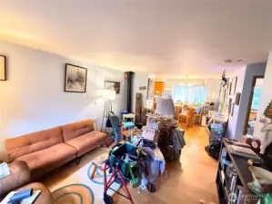 The living room, hallway, and both bedrooms feature bamboo floors.