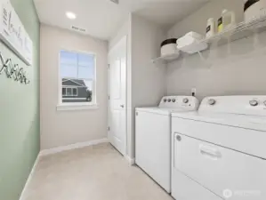 2nd level utility room with openable window. Photo is representational. Actual home is under construction and finishes and paint colors may vary. See site agent for details....