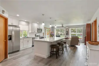 Bright and light and open dream kitchen with huge island!