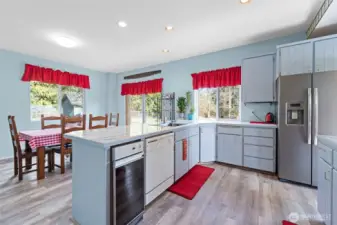Another view of this wonderful kitchen~gleaming coated porcelain counters