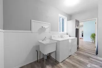 You will LOVE this laundry room/mud room and additional pantry space.