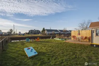 Enjoy sunsets over the creek and bay beyond.