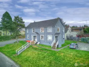 Grassy lawn in front and back