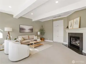 Unwind in a light-filled sanctuary defined by architectural coffered ceilings and a cozy fireplace.