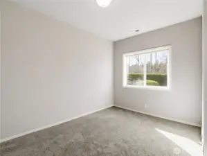 Private lower-level bedroom for guests or extended living