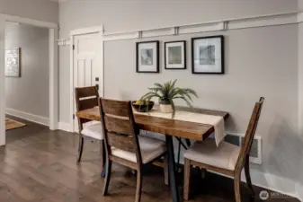 Sprawling main floor with dining area. Charming 6ft picture ledge