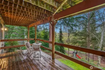 Enjoy your morning coffee or BBQ with guests on this roomy covered deck!