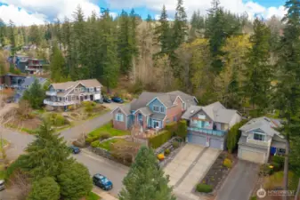 Perched between two beautiful homes in the much sought after Silver Beach Neighborhood and backing up to greenbelt, this beautiful home is what living in the Great NW is all about.