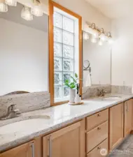 Primary bath with plenty of storage.