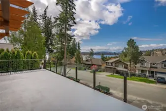 Brand "spankin" new waterproof front deck and rimless glass railing so you never miss a sunset.