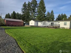 Large backyard for living and gardening.