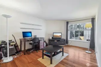 Wood burning fireplace behind TV