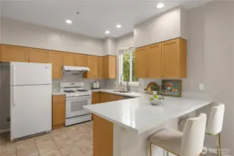 Kitchen with new quartz countertops, new sink and faucet