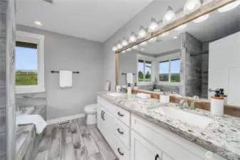 Primary bath w/ dual sinks, soaking tup & separate shower.