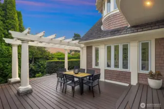 Refinished deck with newly constructed pergola ready for dining al fresco