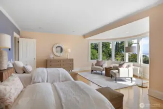 You can see this bedroom can hold two beds and offers a sitting area as well