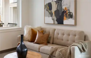 Staging is removed. Imagine yourself sitting in the living room looking out on the porch and courtyard.