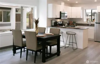 Staging is removed. Enough space for dining formally and informally at the countertops