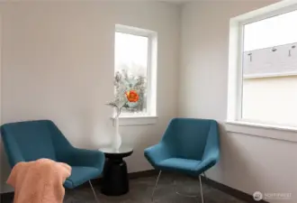 Sitting area in primary room or flex space for work space, nursery, storage? Staging is removed.