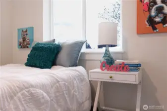 Room 2 on upper floor nice and bright. Staging is removed.